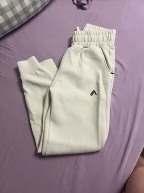 Alphalete Cream Track Joggers with Black Logo